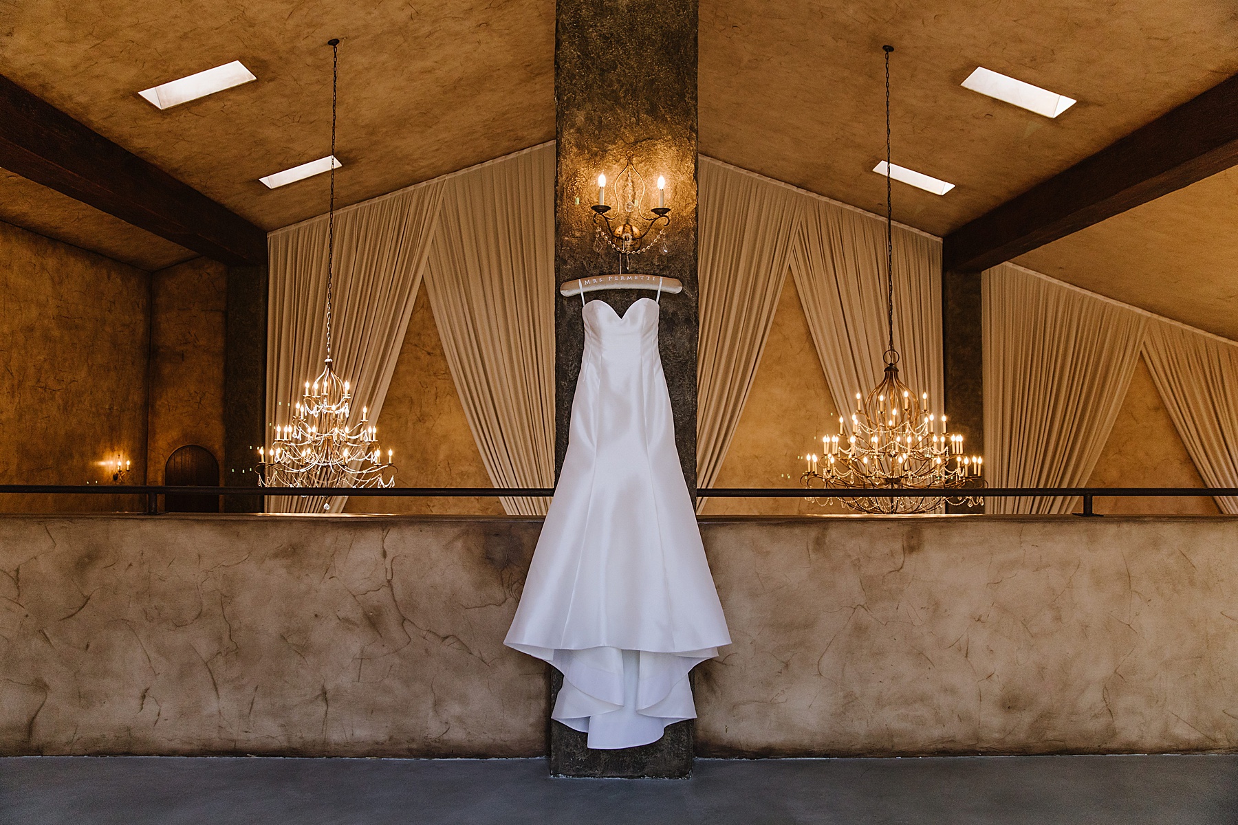 Wedding Dress hanging in the Villa Loriana, a Italian-Inspired Wedding Venue.