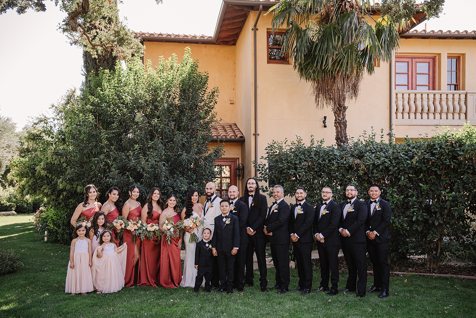 Bride and Groom with their wedding party at the Villa San Juliette, a Italian-Inspired Wedding Venue in San Luis Obispo.
