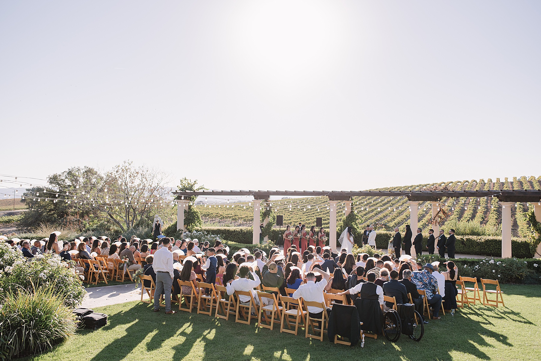 Bride and Groom's wedding ceremony with guests at the Villa San Juliette, a Italian-Inspired Wedding Venue in San Luis Obispo.