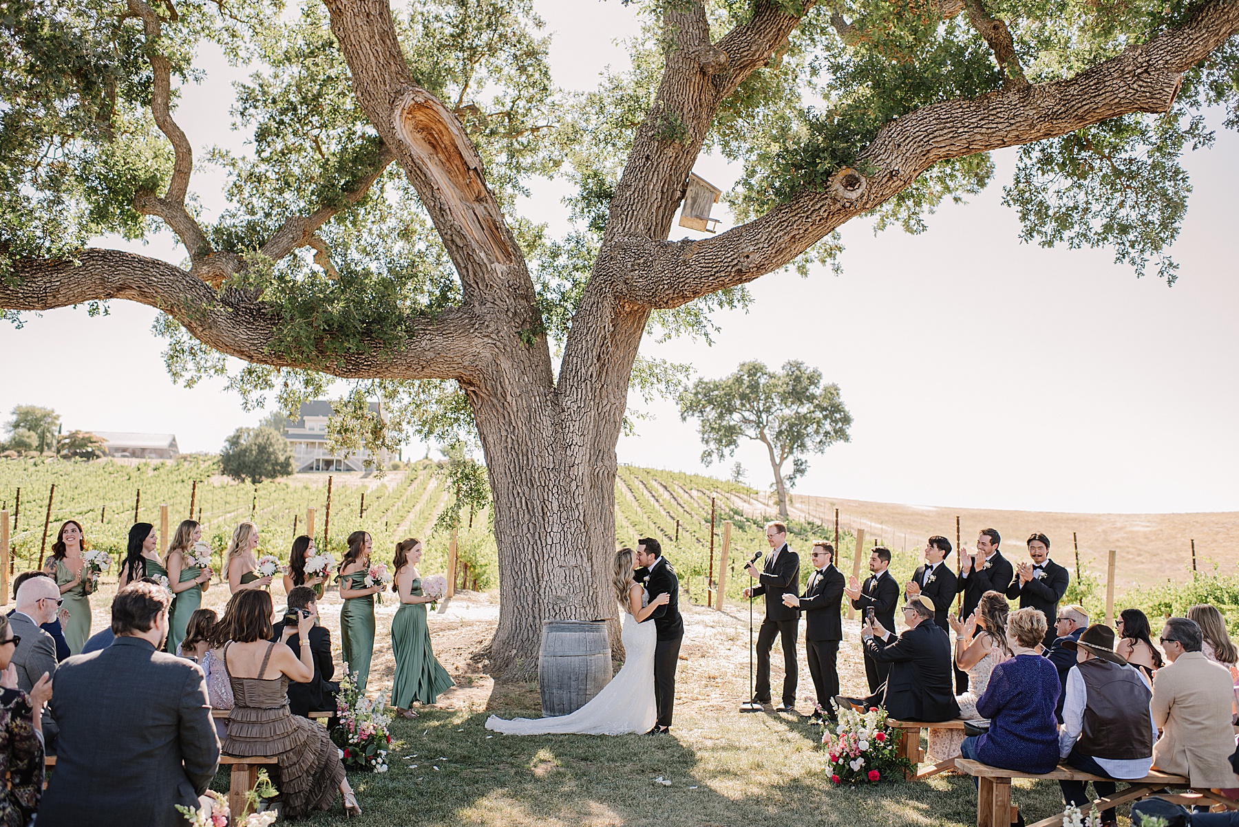 Experience the magic of a luxury wedding Ellas Vineyard in Paso Robles, CA. From breathtaking sunset photos to exquisite details.