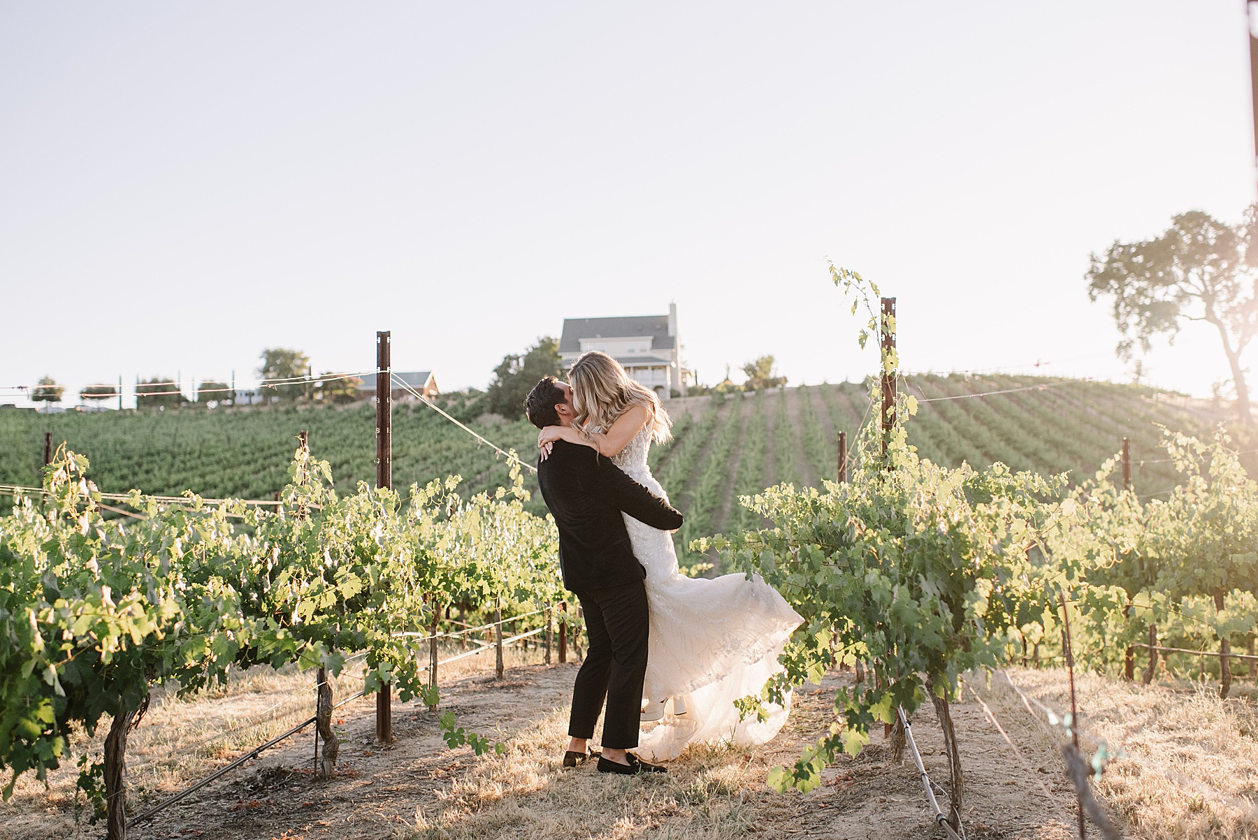 Experience the magic of a luxury wedding Ellas Vineyard in Paso Robles, CA. From breathtaking sunset photos to exquisite details.