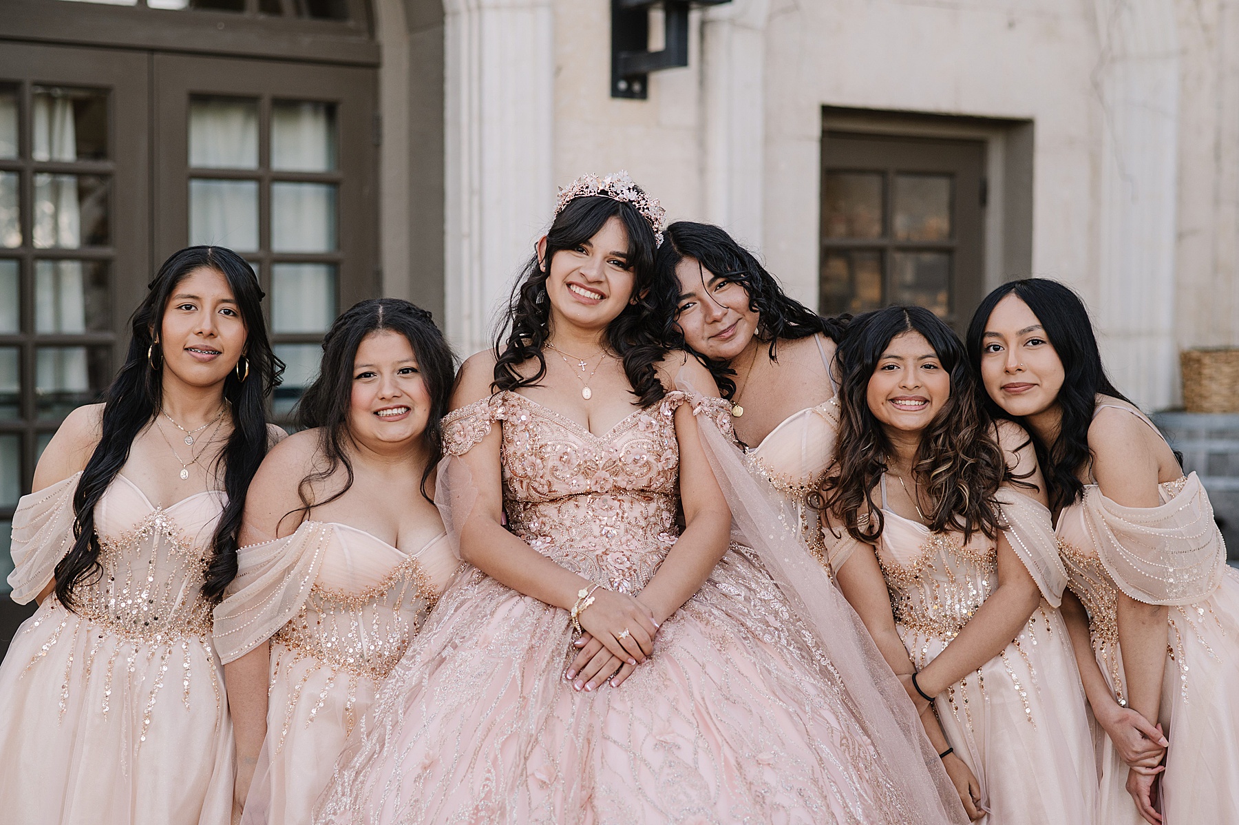 Mary Luz radiates elegance in her blush gown and crown at her Tooth + Nail Winery Quinceañera celebration.