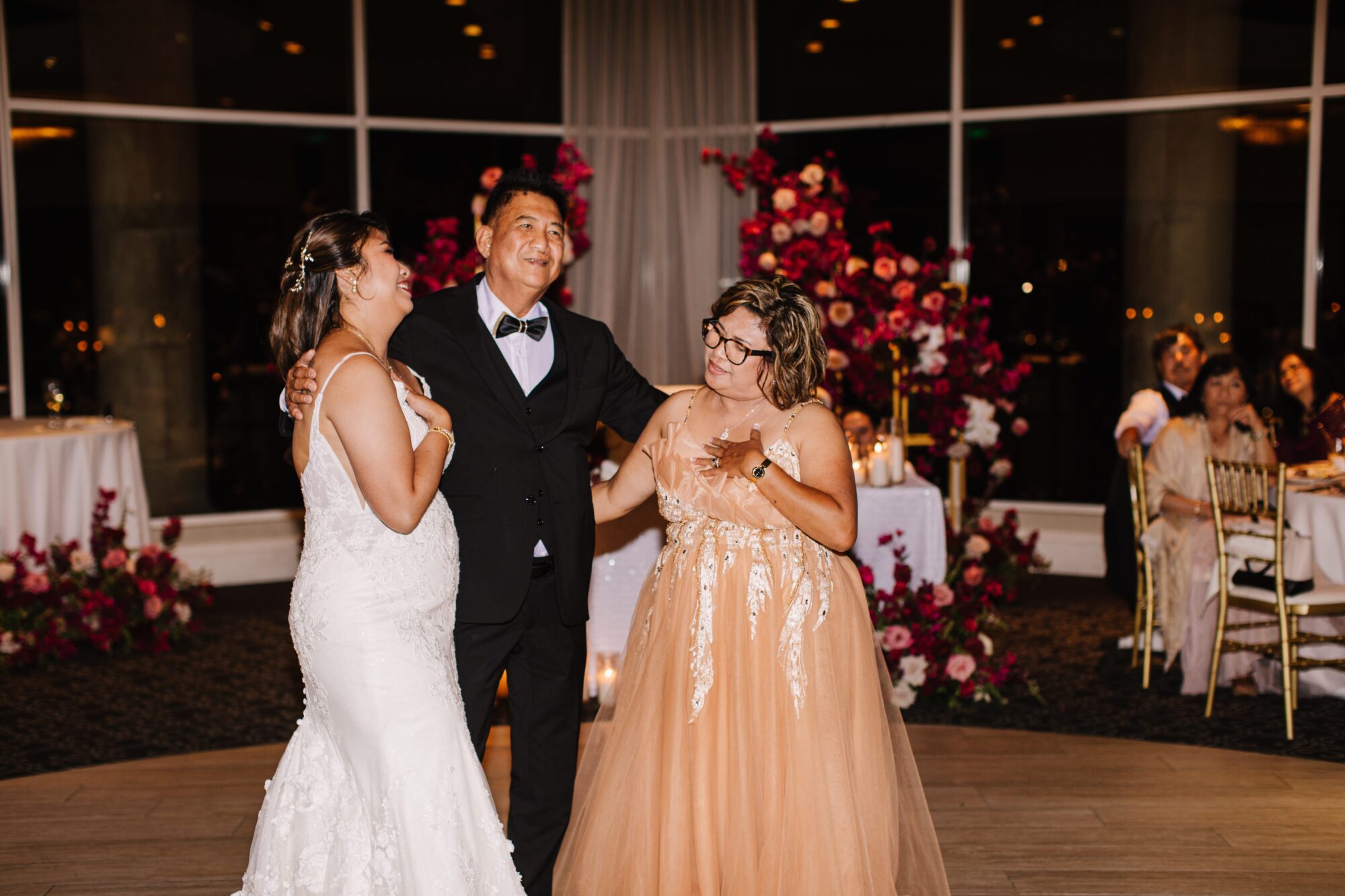 A heartfelt family dance moment during a vibrant 2025 wedding celebration, showcasing love and connection.